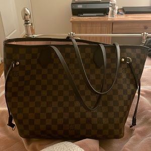 Authentic Louis Vuitton never full with pink interior